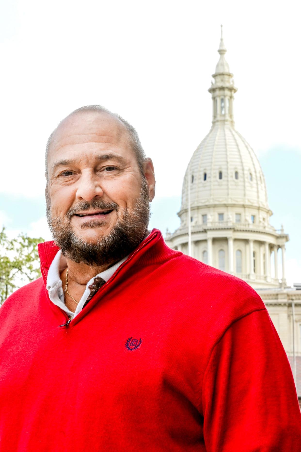 Lansing native Tom Izzo, pictured on Wednesday, April 24, 2024, near the Capitol, is running for state representative.