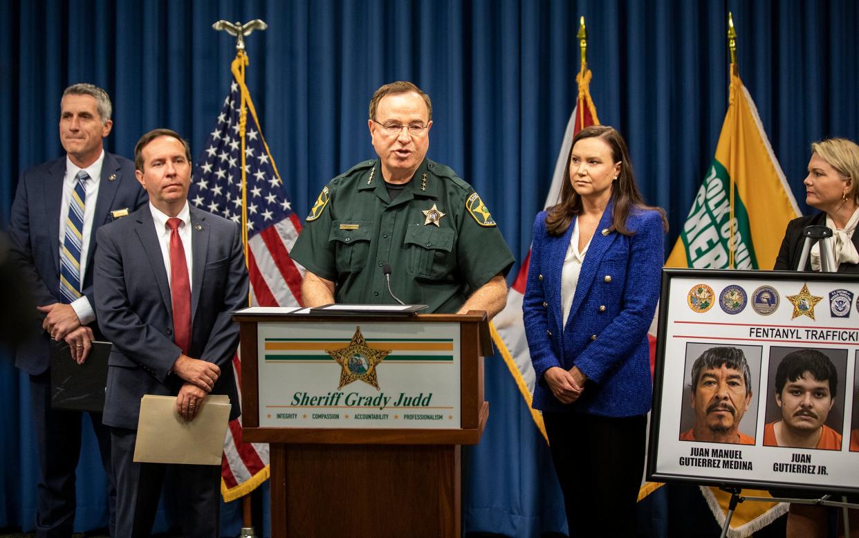 Polk County Sheriff Grady Judd announces arrests made in a major fentanyl-trafficking ring during a press conference at the Sheriff's Operations Center in Winter Haven on Tuesday. Accompanying the sheriff are FDLE Commissioner Mark Glass, State Attorney Brian Haas, Florida Attorney General Ashley Moody and State Attorney Susan Lopez.