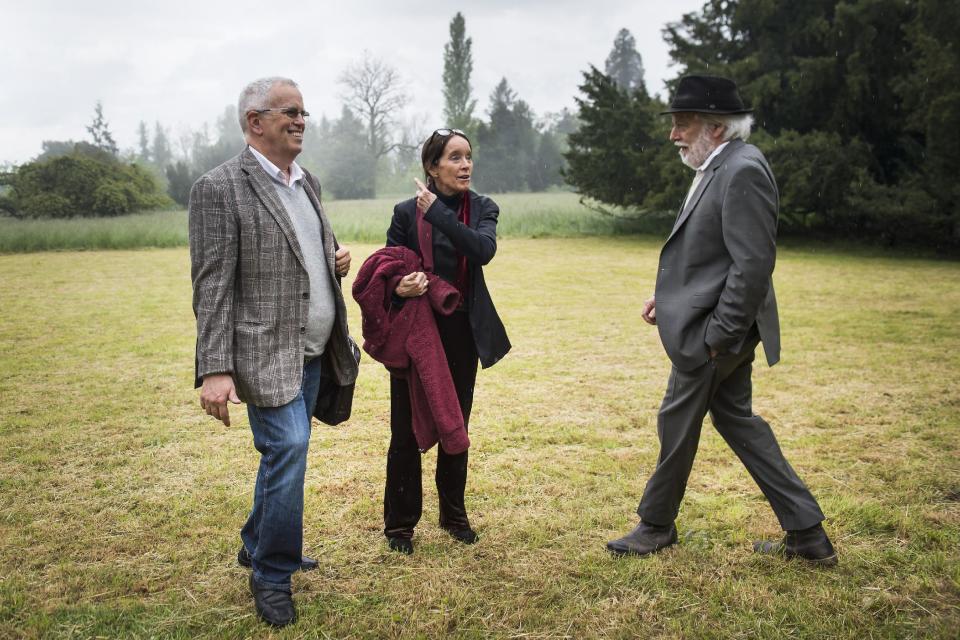 Eugene Chaplin, left, Victoria Chaplin, center, and Michael Chaplin, right, all children of Charlie Chaplin, pose for photographers outside the Swiss mansion where their famous father lived the last 25 years of his life. Chaplin’s family and supporters gathered Wednesday, May 7, 2014, to discuss the future of the Charlie Chaplin Museum planned at the Manoir de Ban, an estate along Lake Geneva in Corsier-sur-Vevey, Switzerland. The museum, called “Chaplin’s World, will be a dedicated space to introduce Chaplin and his work to new generations. A spring 2016 opening is planned. (AP Photo/Keystone, Jean-Christophe Bott)