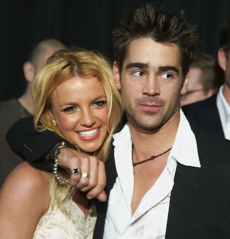 <p>Kevin Winter/Getty Images</p> Britney Spears and Colin Farrell in Hollywood in January 2003