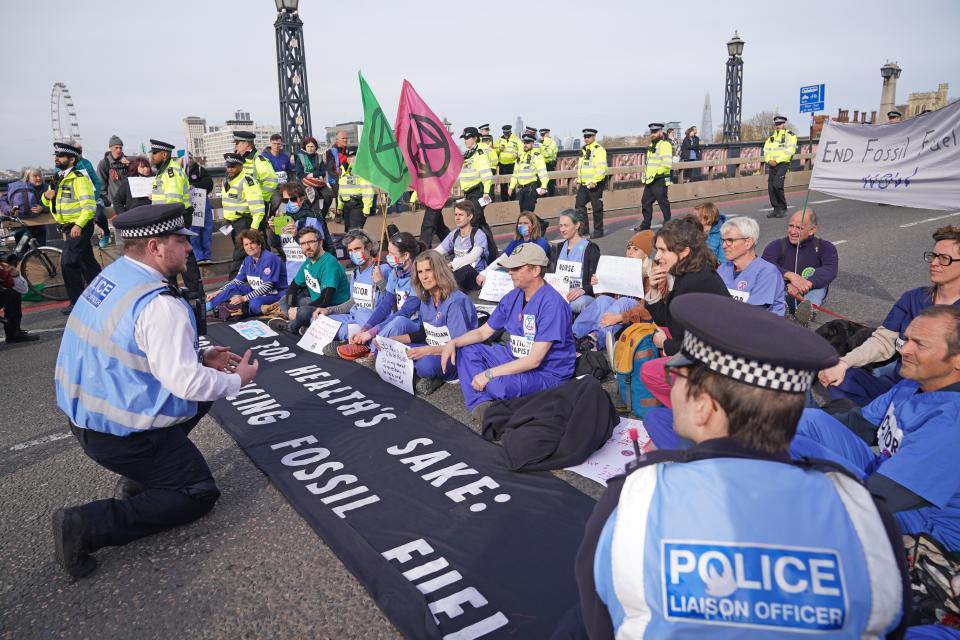 Extinction Rebellion protesters blocking Lambeth Bridge in June (Yui Mok/PA)