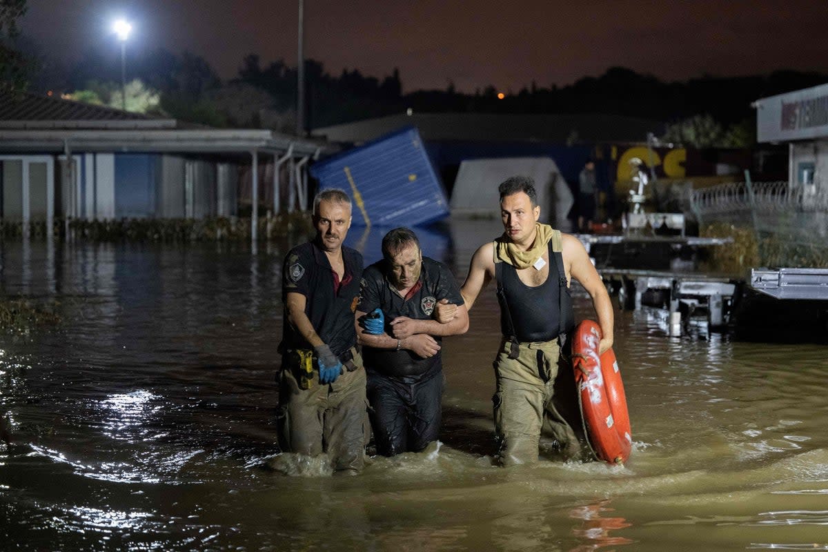 A man is rescued and evacuated during flooding in Kucukcekmece, Istanbul (AFP via Getty Images)