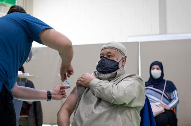 The province is expanding vaccine eligibility for more people over the age of 18 in regions hardest hit by the virus, starting with Toronto and Peel Region. Vaccinations were underway at TARIC Islamic Centre in Toronto as part of Humber River Hospital's mobile clinic efforts.