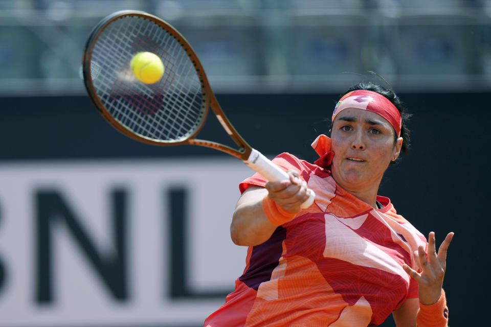 FILE - Tunisia's Ons Jabeur returns the ball to Spain's Paula Badosa during their match at the Italian Open tennis tournament, in Rome, Friday, May 12, 2023. Play begins at the French Open on Sunday, May 28, 2023. (AP Photo/Andrew Medichini, File)