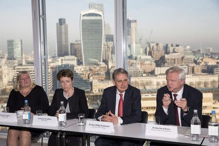 Britain's Chancellor of the Exchequer Philip Hammond (2nd R) and the Secretary of State for Exiting the European Union David Davis (R) attend a meeting with executives from the financial services at The Shard in London, December 5, 2016. REUTERS/Jack Taylor/Pool
