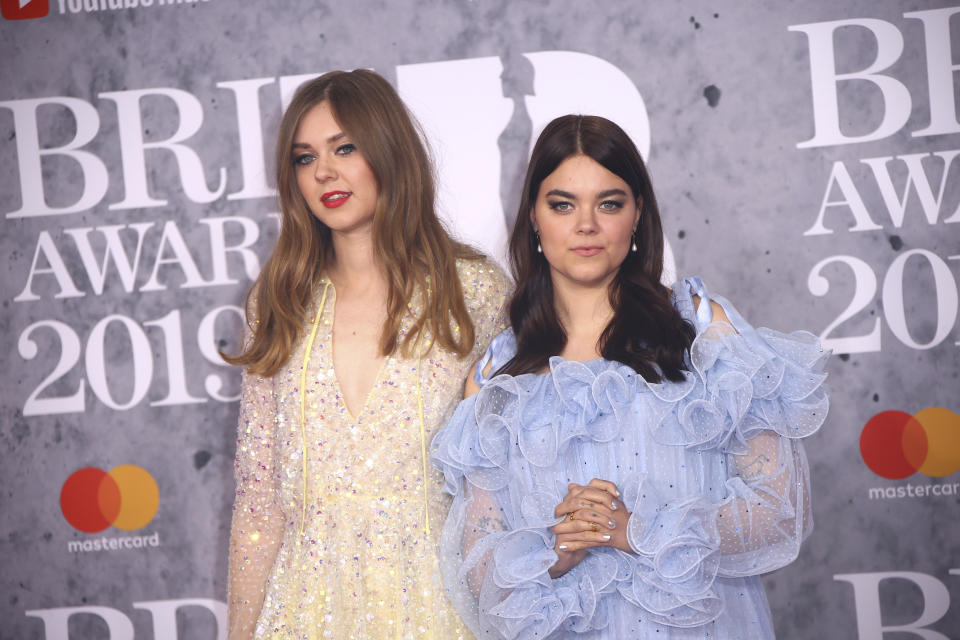 Singers Klara Soderberg, left, and Johanna Sderberg from the band 'First Aid Kit' pose for photographers upon arrival at the Brit Awards in London, Wednesday, Feb. 20, 2019. (Photo by Joel C Ryan/Invision/AP)