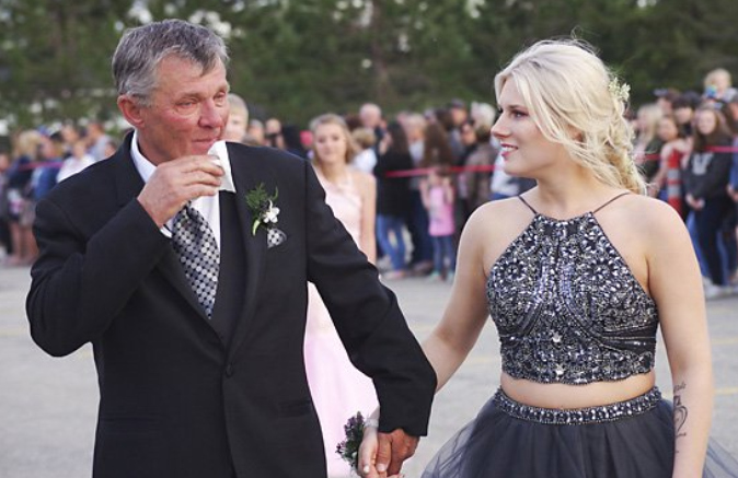 <span>Carson Curtis, </span>the father of 18-year-old Marshall Curtis who died in a car accident in May, stepped up to take his son’s girlfriend, Mackenzie <span>Stewart,</span> to the prom. (Photo: Courtesy of Elizabeth Curtis)