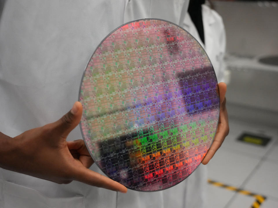 A silicon wafer with chips etched into 