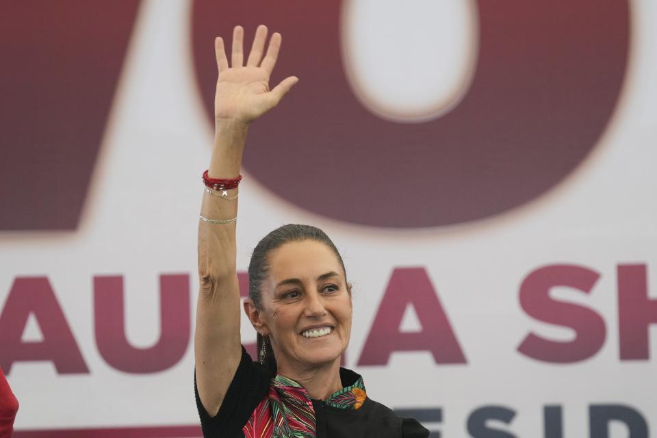 Mexican presidential hopeful Claudia Sheinbaum greets supporters upon arriving at a campaign rally in Mexico City, Thursday, May 16, 2024. General elections are scheduled for June 2. (AP Photo/Marco Ugarte)