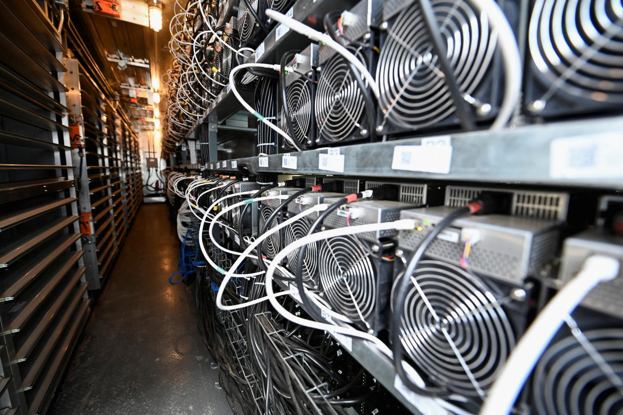 A bank of cryptocurrency miners 