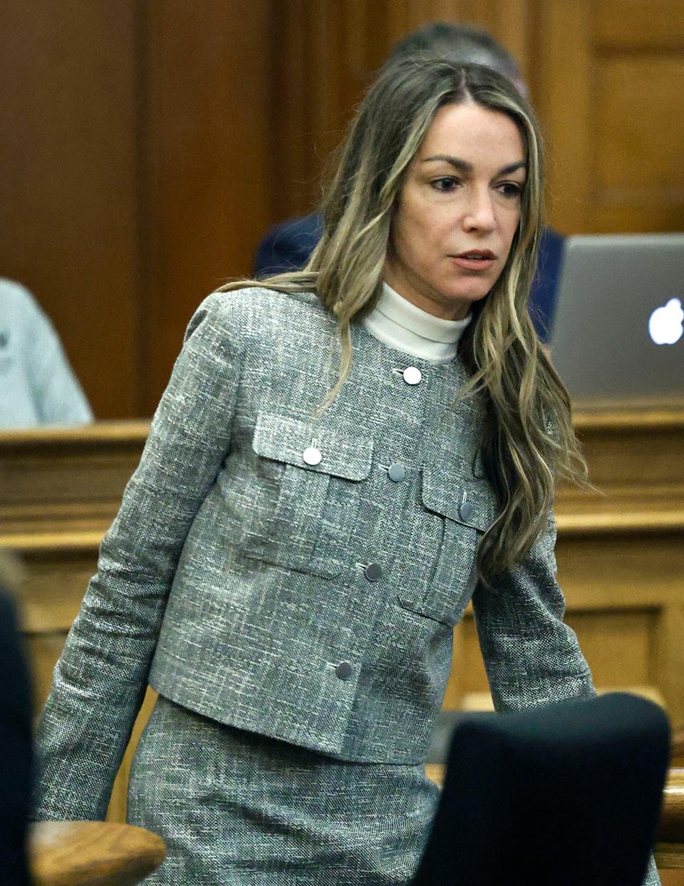 Karen Read enters a court room in Norfolk Superior Court in Dedham on Wednesday, May 8, 2024, for her trial on murder charges in the death of her boyfriend, John O’Keefe.