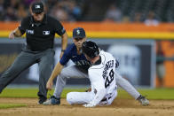 Seattle Mariners second baseman Adam Frazier tags Detroit Tigers' Kerry Carpenter (48) out at second base in the sixth inning of a baseball game in Detroit, Wednesday, Aug. 31, 2022. (AP Photo/Paul Sancya)