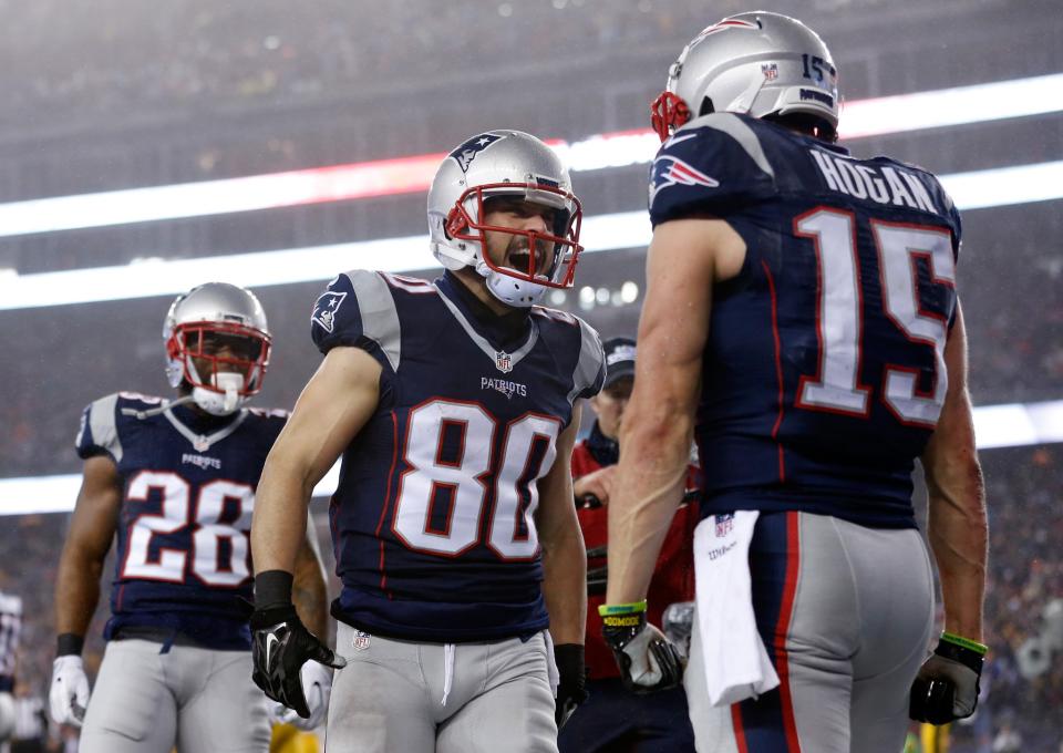 <p>Chris Hogan #15 of the New England Patriots celebrates with Danny Amendola #80 after scoring a touchdown during the first quarter against the Pittsburgh Steelers in the AFC Championship Game at Gillette Stadium on January 22, 2017 in Foxboro, Massachusetts. (Photo by Jim Rogash/Getty Images) </p>