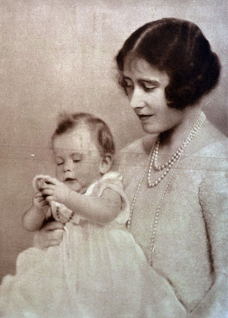 the duchess of york, later queen elizabeth with her infant daughter