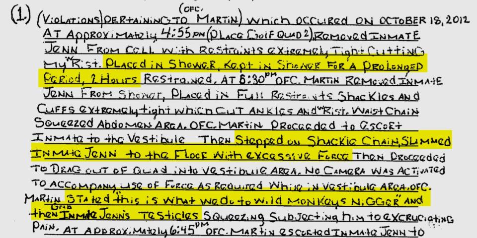 A handwritten civil complaint from a Florida prisoner who describes being locked in a shower stall in handcuffs and shackles.