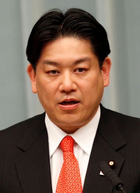 FILE PHOTO: Japan's newly-appointed Land, Infrastructure, Transport and Tourism Minister Hata attends a news conference at the premier's official residence in Tokyo