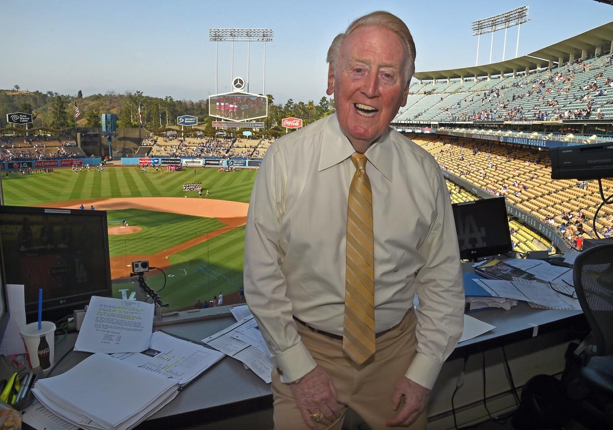 Los Angeles Dodgers broadcaster Vin Scully in the booth before the game between the Los Angeles Dodgers and the Arizona Diamondbacks at Dodger Stadium on July 30, 2016 in Los Angeles, California.