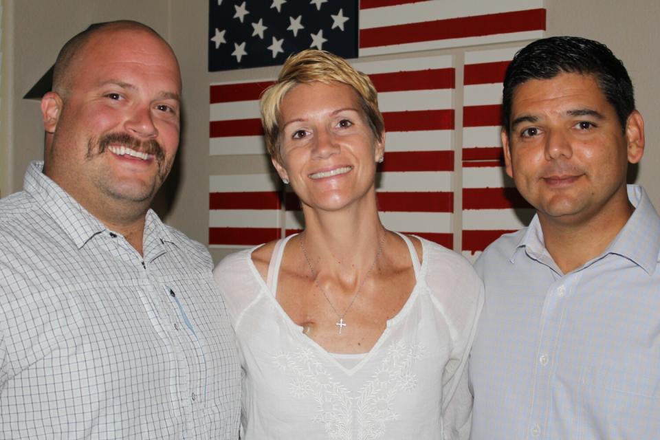 Rep. Raul Ruiz (D-Palm Springs) poses with Jennifer Kepner, middle, and her husband Ben Kepner,