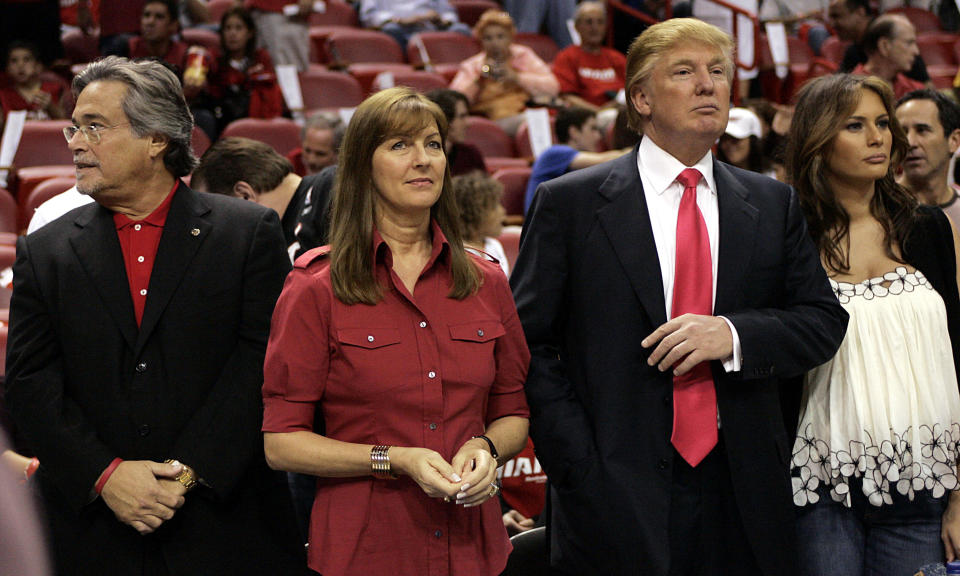 Micky and Madeleine Arison with Donald and Melania Trump at a Miami Heat basketball game in December 2005. Arison is both the Miami Heat team owner and founder of cruise giant Carnival Corporation. (Photo: Eliot J. Schechter via Getty Images)