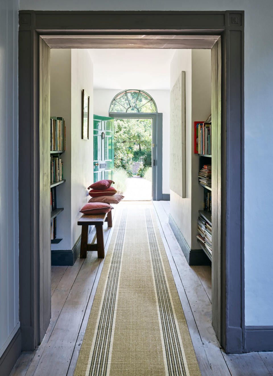 <p> Opt for&#xA0;hallway runner ideas&#xA0;to add color and pattern to the hall and lead the eye up and down the space. It can reduce noise, too. </p> <p> Note the books and pictures in this space &#x2013; even&#xA0;small hallways&#xA0;can be furnished to feel like a room, not a thoroughfare, to make them feel far more welcoming.&#xA0; </p>