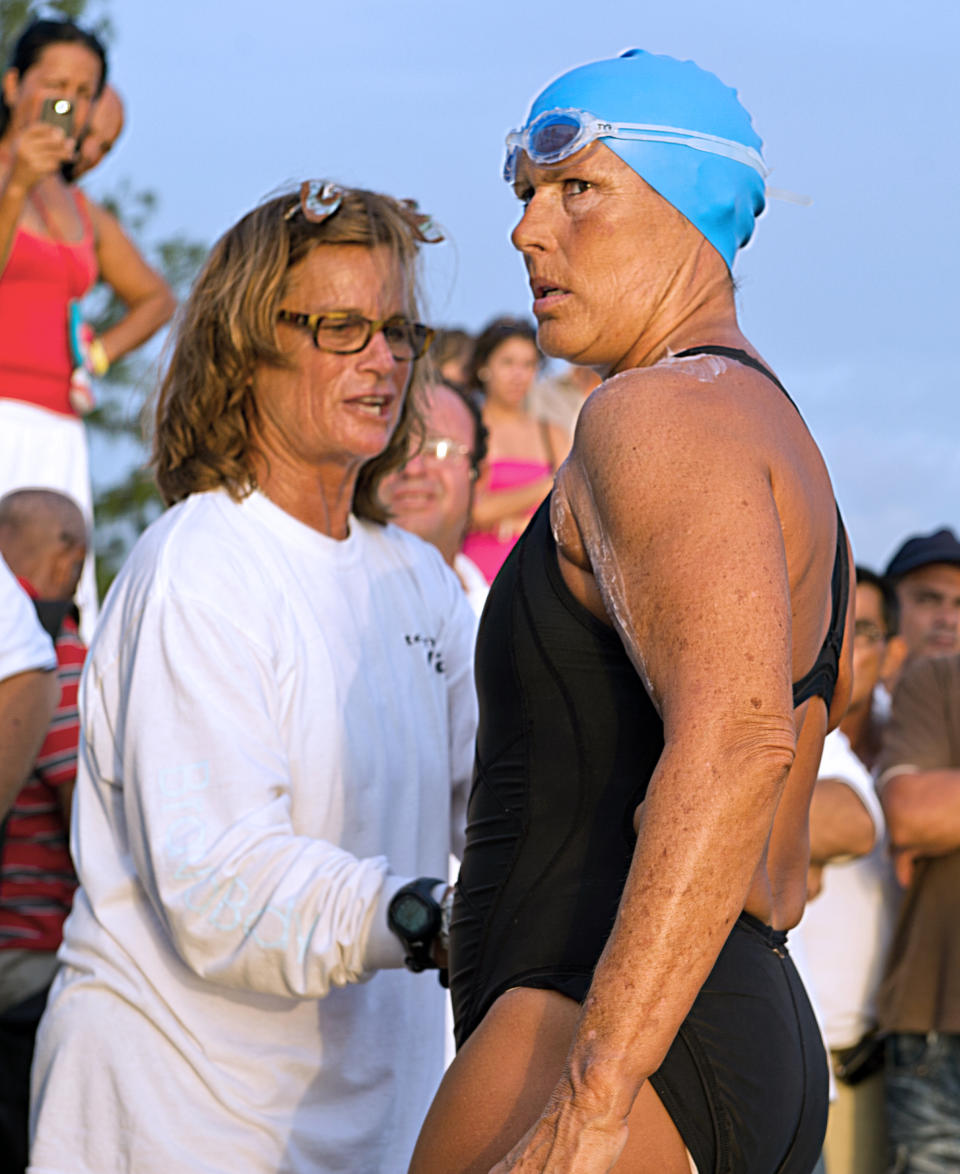 US swimmer Diana Nyad puts cream on at Ernest Hemingway Nautical Club, in Havana on August 7, 2011, before swimming from Havana to Florida in a three-day non-stop journey.  AFP PHOTO/ADALBERTO ROQUE (Photo credit should read ADALBERTO ROQUE/AFP/Getty Images)