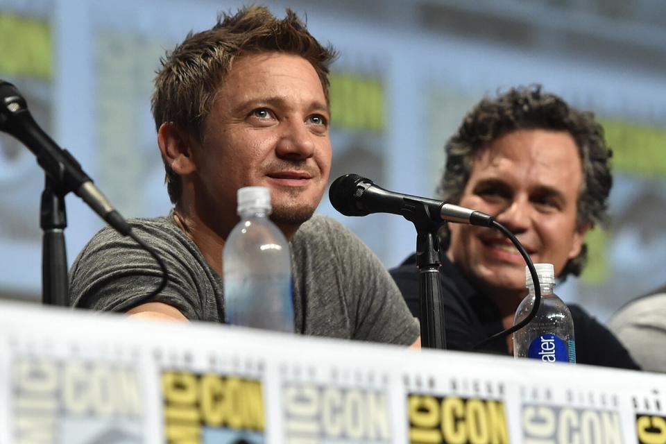 Jeremy Renner (L) and Mark Ruffalo onstage at Marvel's Hall H Panel for "Avengers: Age Of Ultron" during Comic-Con International 2014