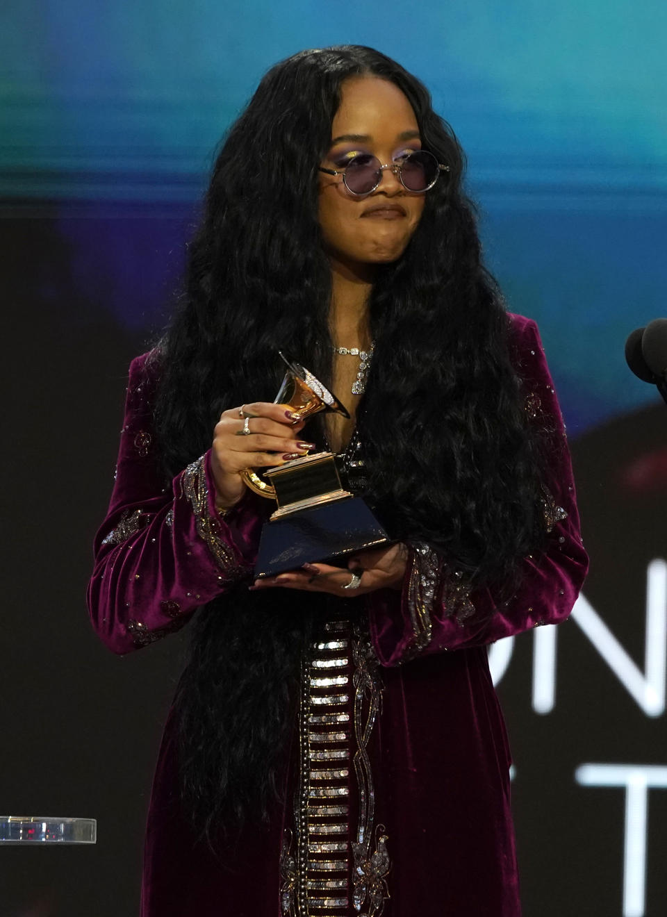 H.E.R. accepts the award for song of the year for "I Can't Breathe" at the 63rd annual Grammy Awards at the Los Angeles Convention Center on Sunday, March 14, 2021. (AP Photo/Chris Pizzello)