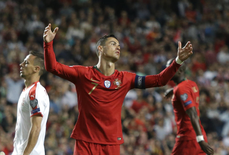 Portugal's Cristiano Ronaldo reacts during the Euro 2020 group B qualifying soccer match between Portugal and Serbia at the Luz stadium in Lisbon, Portugal, Monday, March 25, 2019. (AP Photo/Armando Franca)