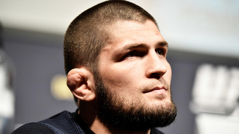 Khabib Nurmagomedov answers questions at a press conference.