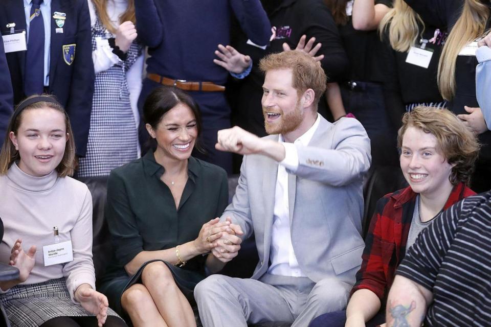 The royal couple share a joke as they meet with young people on a visit to Joff Youth Centre in Peacehaven, East Sussex (AFP/Getty Images)