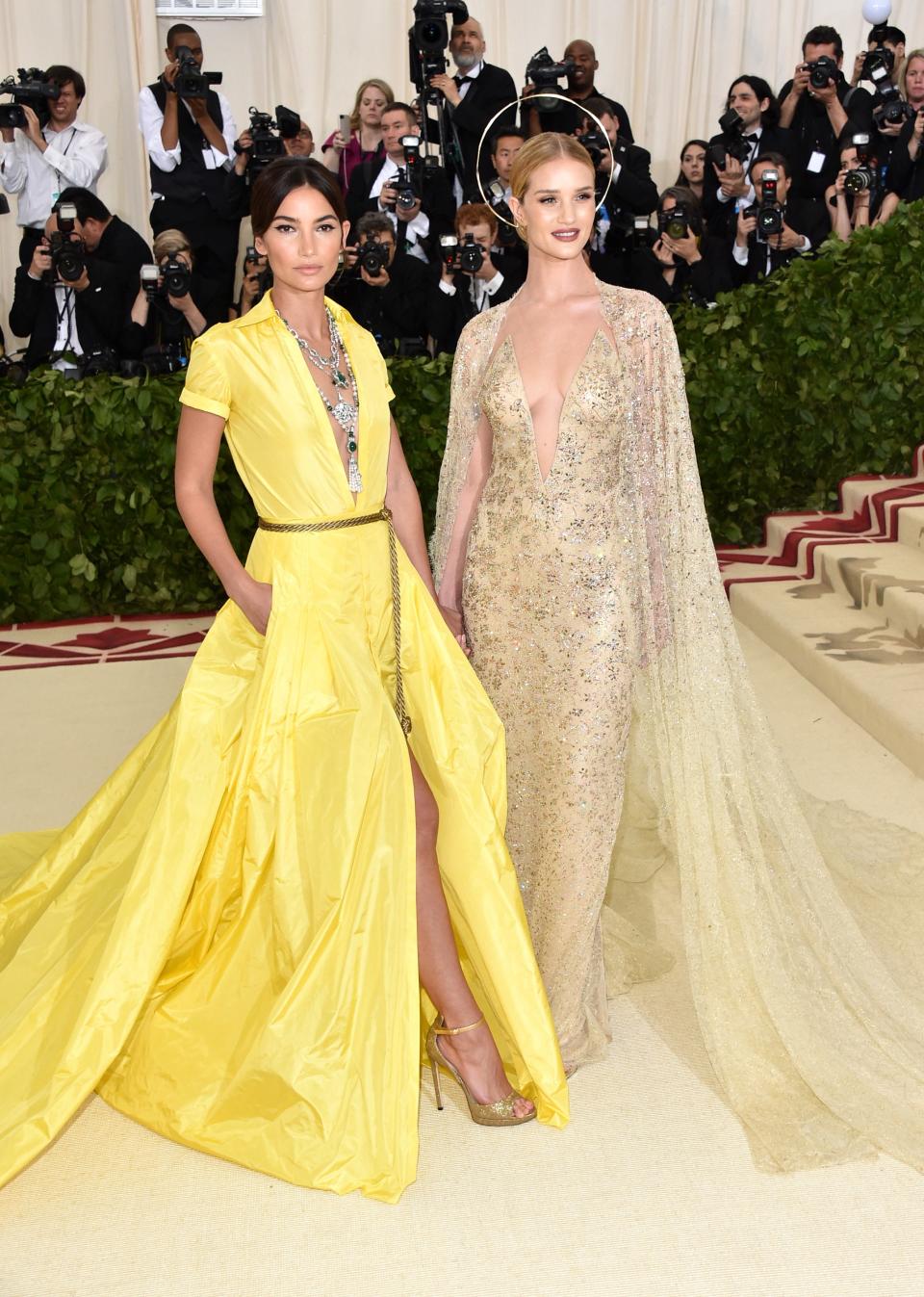 <h1 class="title">Lily Aldridge and Rosie Huntington-Whiteley in Ralph Lauren and Anita Ko jewelry and Ana Khouri jewelry</h1><cite class="credit">Photo: Getty Images</cite>