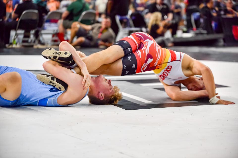 Wadsworth's Jaxon Joy, bottom, has made his first semifinal at the Junior Freestyle National Championships in Fargo, N.D.