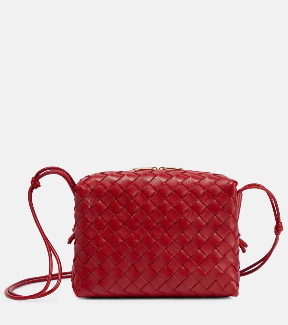 <p><a href="https://go.redirectingat.com?id=74968X1596630&url=https%3A%2F%2Fwww.mytheresa.com%2Fus%2Fen%2Fwomen%2Fbottega-veneta-loop-mini-leather-crossbody-bag-red-p00734861&sref=https%3A%2F%2Fwww.townandcountrymag.com%2Fstyle%2Fg60433387%2Famy-jackson-styling-basics%2F" rel="nofollow noopener" target="_blank" data-ylk="slk:Shop Now;elm:context_link;itc:0;sec:content-canvas" class="link ">Shop Now</a></p><p>Loop Small leather camera bag</p><p>mytheresa.com</p><p>$1250.00</p>