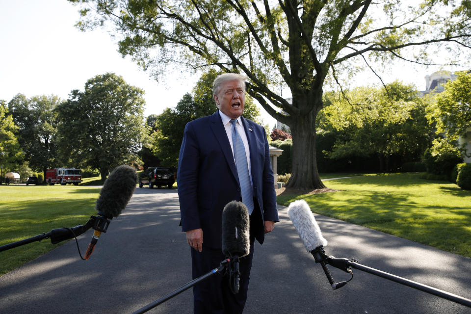 FILE - In this May 15, 2020, file photo President Donald Trump speaks with reporters as he departs the White House on Marine One in Washington. (AP Photo/Alex Brandon, File)