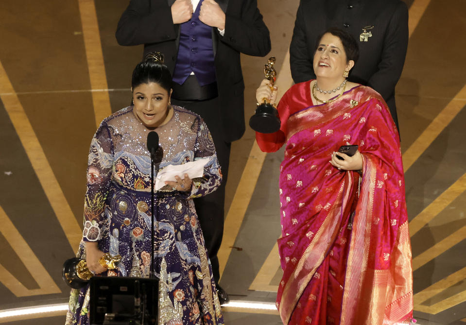 Kartiki Gonsalves and Guneet Monga accept the award for Best Documentary Short Subject for The Elephant Whisperers during the Academy Awards on March 12.