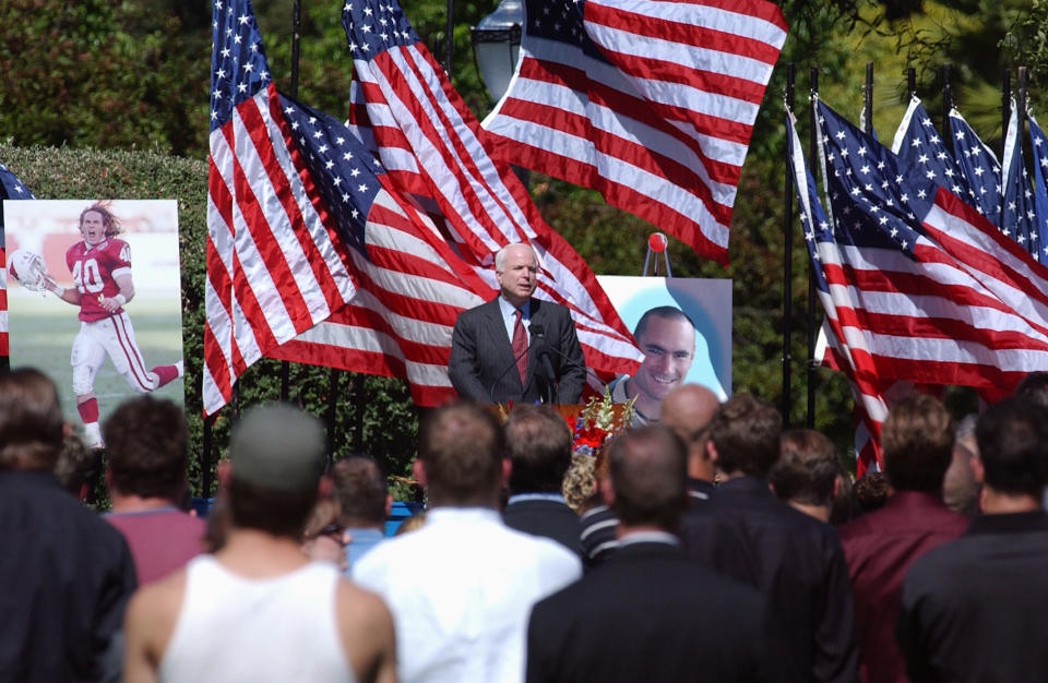 Senator John McCain (R-AZ) speaks at a memorial service held by the family of Cpl. Pat Tillman for Tillman, who was killed in action in Afghanistan April 22, 2004, at the San Jose Municipal Rose Garden May 3, 2004 in San Jose, California. Tillman turned down a lucrative NFL contract to serve with as a US Army Ranger. (Photo by David Paul Morris/Getty Images)