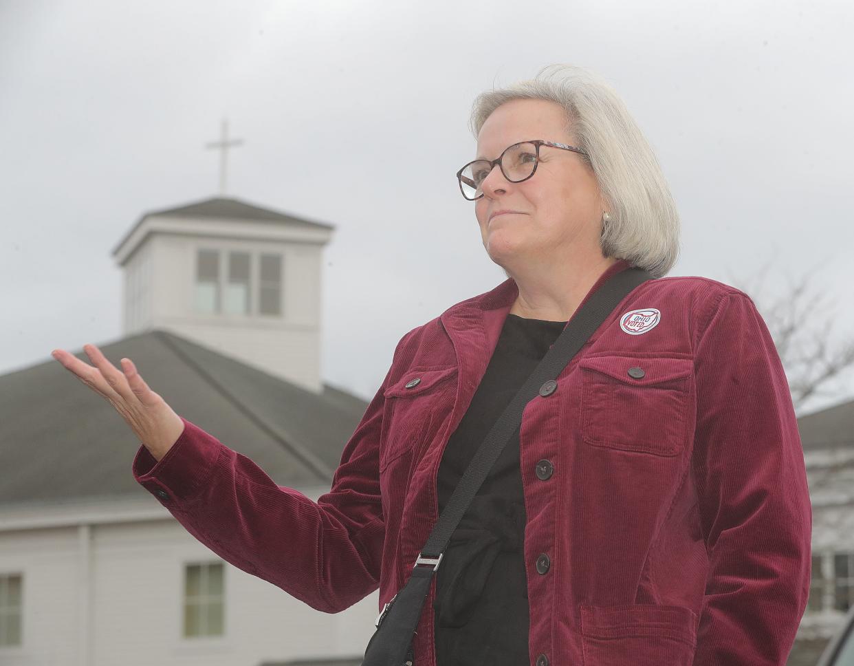 Monique Mason talks about her votes casted on Issues 1 and 2 on Tuesday, Nov. 7, 2023, in Bath Township, Ohio, at Bath United Church of Christ. [Phil Masturzo/ Beacon Journal]