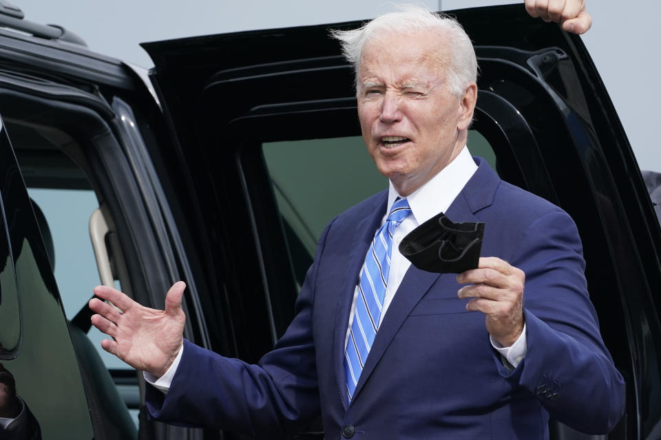 President Joe Biden responds to a question about the short term deal on debt as he arrives Air Force One at O'Hare International Airport in Chicago, Thursday, Oct. 7, 2021. While in the Chicago area, Biden will highlight his order to require large employers to mandate COVID-19 vaccines for its workers during a visit to a construction site. (AP Photo/Susan Walsh)