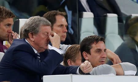 Football - Italy v England - International Friendly - Juventus Stadium, Turin, Italy - 31/3/15 England manager Roy Hodgson looks dejected as coach Gary Neville looks on Action Images via Reuters / Carl Recine Livepic