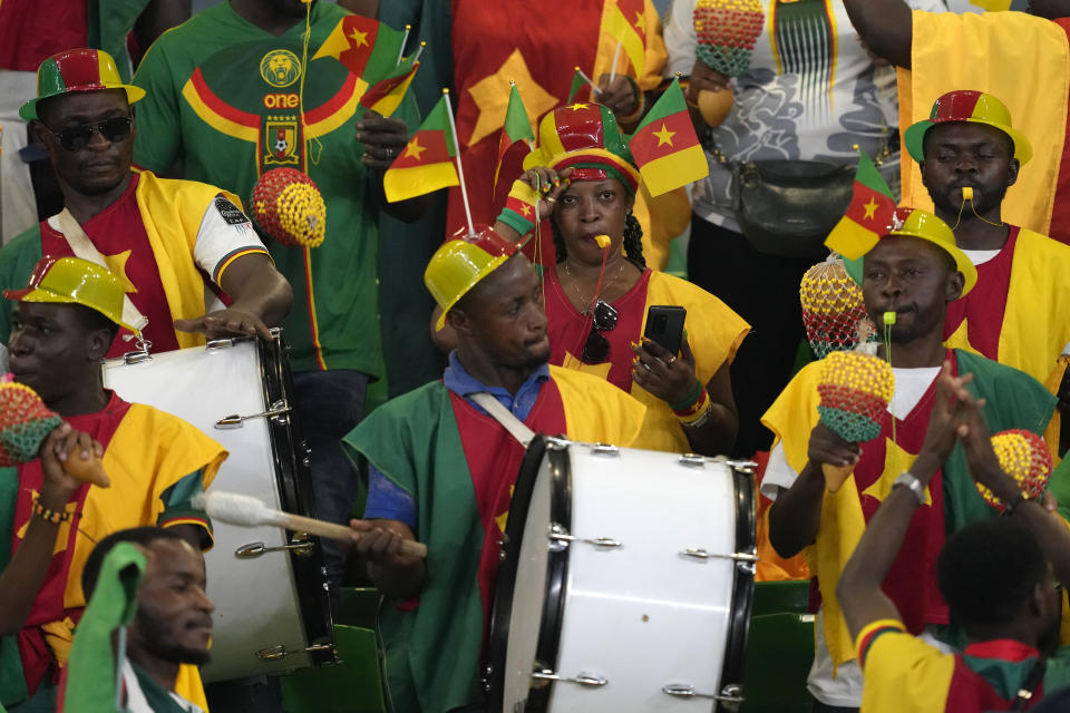 Fans cheer prior the start of the African Cup of Nations Round of 16 soccer match between Nigeria and Cameroon, at the Felix Houphouet Boigny stadium in Abidjan, Ivory Coast, Saturday, Jan. 27, 2024. 2024. (AP Photo/Sunday Alamba)