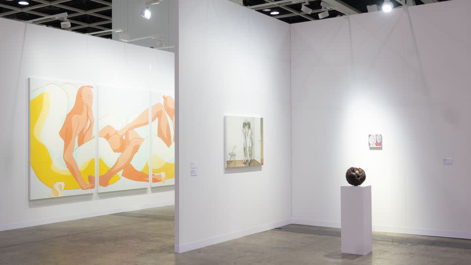 A painting by US artist Ivy Haldeman (left) showing at New York gallery François Ghebaly's booth. - Noemi Cassanelli/CNN