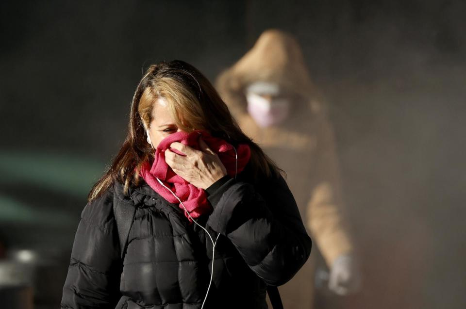 PHOTO: Pedestrians dressed for cold weather walk in Lower Manhattan in New York City, January 2, 2024. (John Angelillo/UPI/Shutterstock)