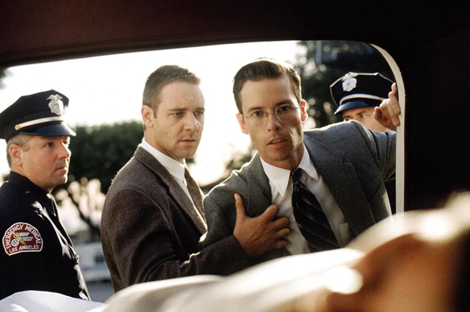 Russell Crowe as Bud White and Guy Pearce as Ed Exley in "L.A. Confidential" (1997).