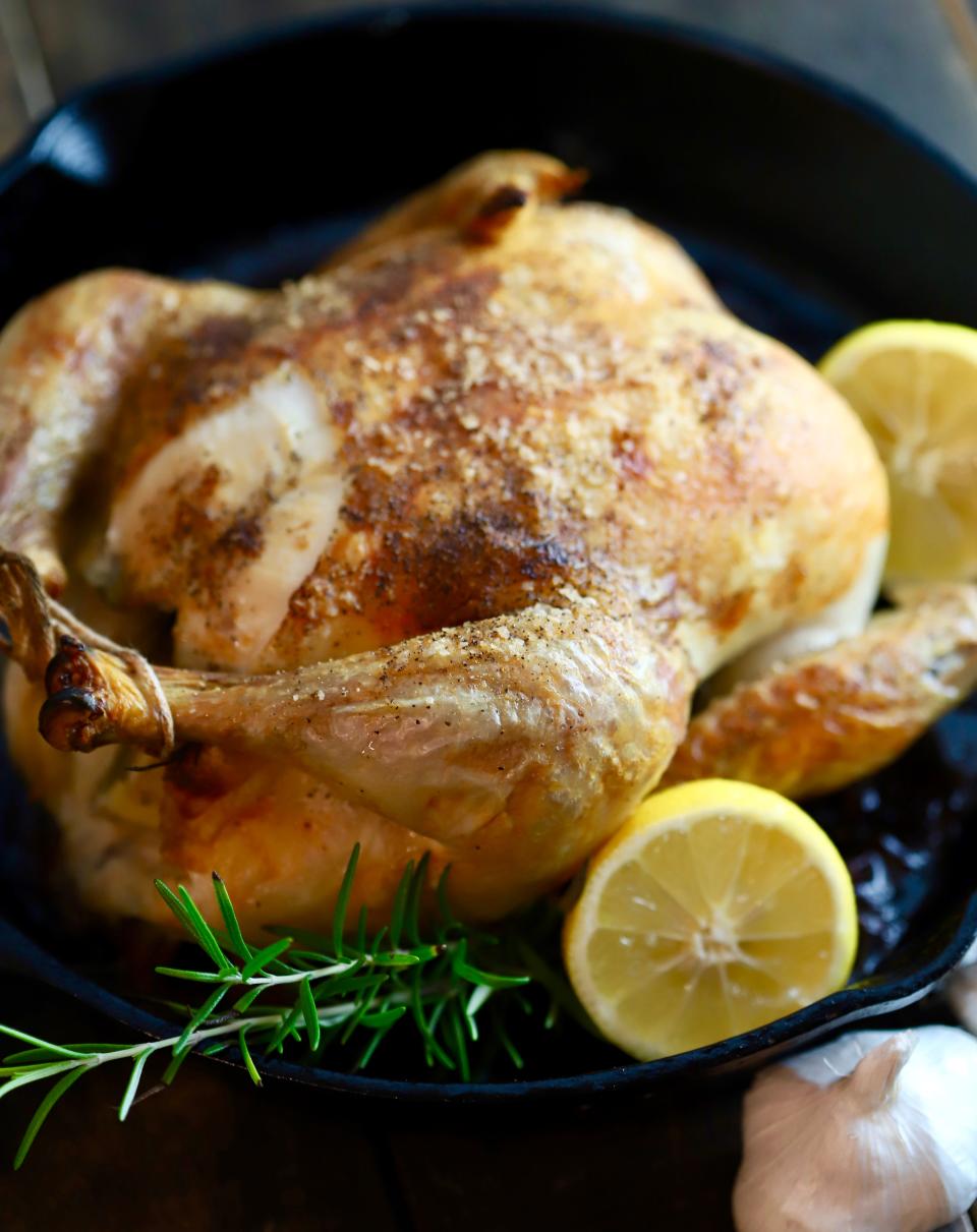 Roast chicken gets a crispy skin cooked in a cast iron skillet.