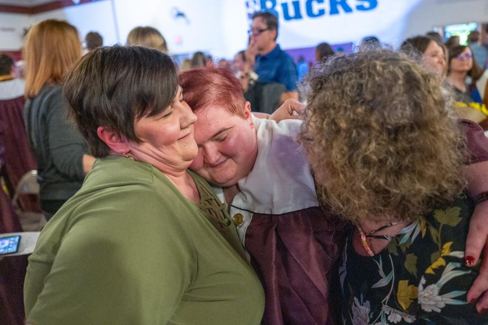 Hannah Blumka, center, hugs her mother Tina Blumka, left, and her grandmother Ruth Arend, right, following the Buchanan High School graduation ceremony Friday, May 27, 2022, at Buchanan High School.