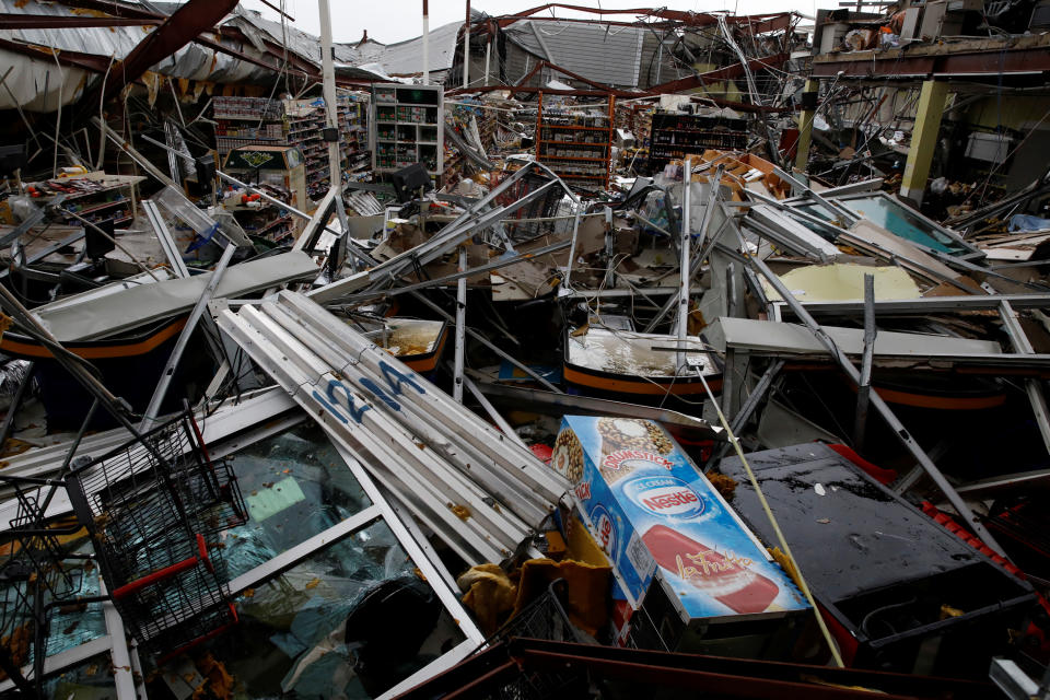 <p>Damages are seen in a supermarket after the area was hit by Hurricane Maria in Guayama, Puerto Rico, Sept. 20, 2017. (Photo: Carlos Garcia Rawlins/Reuters) </p>