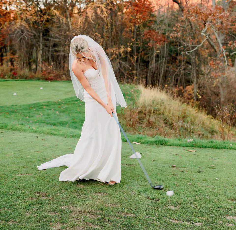 Morgan Lemieux tees off in her wedding dress at Blackstone National Golf Club.