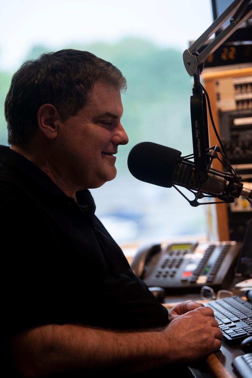 Doug Griffin, takes calls on 94FM The Fish at The Fish radio station in Nashville, Tenn., Friday, April 19, 2024.