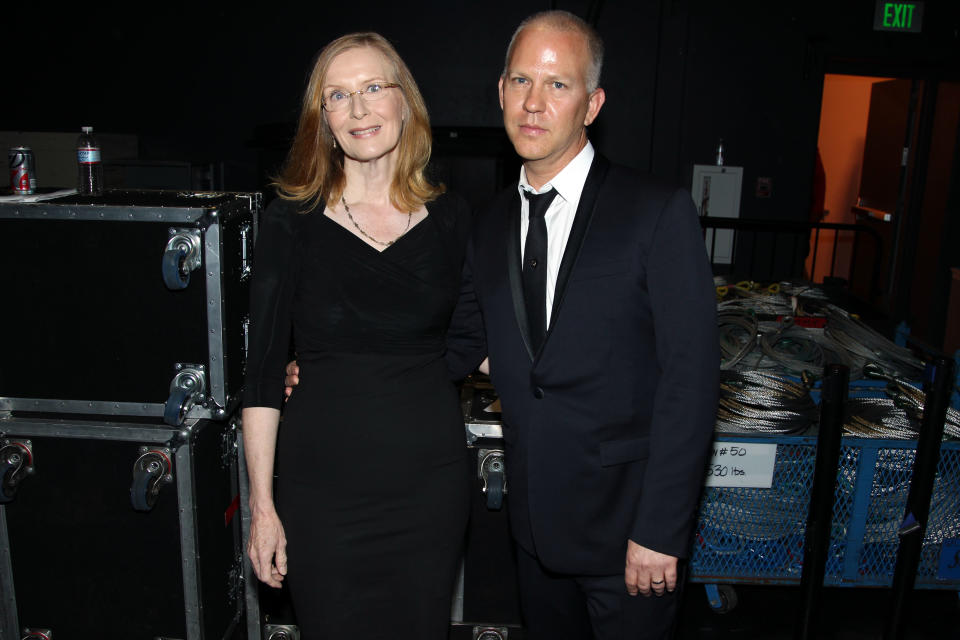 Frances Conroy, left, and Ryan Murphy pose backstage at the 2012 Creative Arts Emmys at the Nokia Theatre on Saturday, Sept. 15, 2012, in Los Angeles. (Photo by Matt Sayles/Invision/AP)