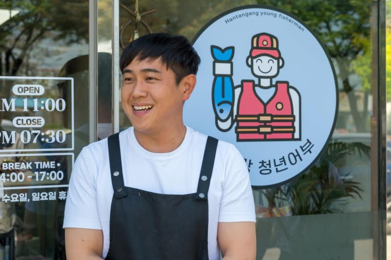 Kim Eun-beom, 35, has started a successfulul fishing and restaurant business along with a high-profile social media channel in rural Yeoncheon County, South Korea. Photo by Thomas Maresca/UPI